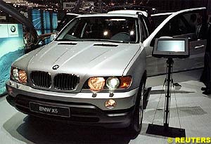 A BMW X5 3.0 is displayed at the Geneva Car Show 