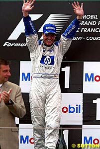 Ralf Schumacher celebrates his win