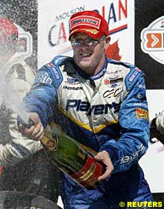 Paul Tracy celebrates his second consecutive victory in Canada