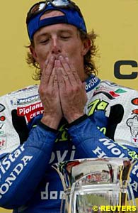 Sete Gibernau takes it all in after winning the race at the Sachsenring