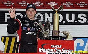 Ryan Newman signals his fourth victory in this year's Winston Cup series