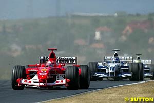 Schumacher followed by the Williams 