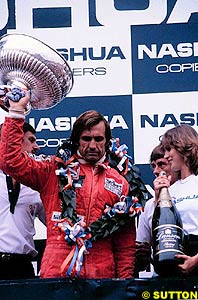 Carlos Reutemann celebrates victory at Kyalami in 1981, but the event was declared a non-championship race as only FOCA affiliated cars took part