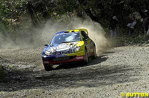 Valentino Rossi practicing for last year's Rally GB in a Peugeot 206 WRC