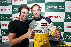 The 2002 Formula Nissan champ Ricardo Zonta congratulates the 2003 champ Franck Montagny