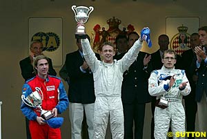The podium, with Bjorn Wirdheim, left standing next to surprise race winner Nicolas Kiesa