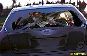 Luis Moya's handiwork - the smashed rear window of the Corolla after his helmet went through it