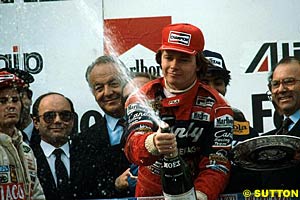 Pironi celebrates as Villeneuve looks