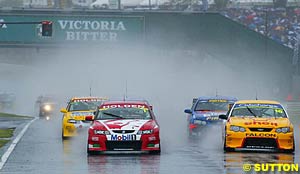 Mark Skaife and Max Wilson show the way at the start of race one before their clash at turn two