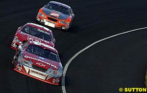 Second place finisher Kevin Harvick leads near-winner Bill Elliott and seventh place finisher Tony Stewart