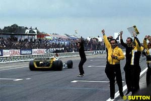 The Renault team celebrate Jean Pierre Jabouille's first win and their first Grand Prix victory and at their home Grand Prix French GP, Dijon, 1 July 1979