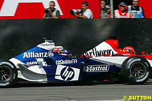 Schumacher and Montoya battle it out at Monza