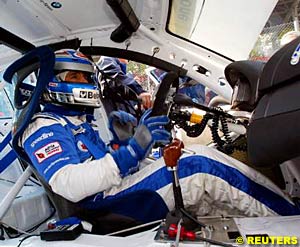 Alex Zanardi sits in his specially prepared 320i, in which he claimed seventh place in race two