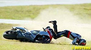 Jeremy McWilliams crashes out at the start of the race