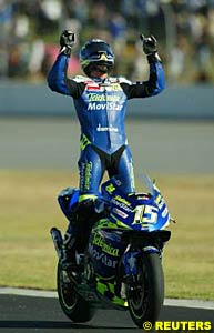 Sete Gibernau stands up after taking the race win