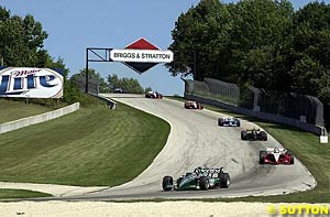 Paul Tracy leads last year's CART event at Road America