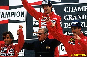 Balestre holds Prost and Mansell while Senna is ignored on the top step