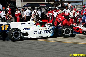 Vitor Meira ended up in Dan Wheldon's pit after contact with Adrian Fernandez