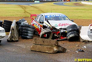 Steve Ellery's car and the barrier after heavy contact