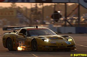 The class winning Corvette of Ron Fellows, Johnny O'Connell and Max Papis at sunset