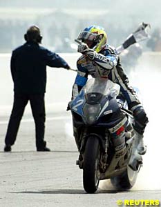 Stephan Chambon celebrates after taking victory for Suzuki at Le Mans