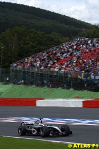 Kimi Raikkonen leading the 2004 Belgian Grand Prix