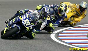 Winner Sete Gibernau leads second place finisher Valentino Rossi and third place finisher Max Biaggi