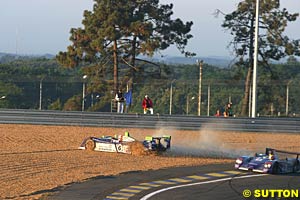 Martin Short in the Rollcentre Dallara sliding through the gravel after being punted off
