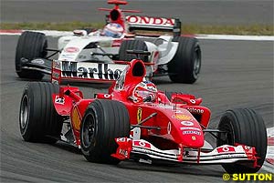 Barrichello leads Button