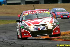 Race one winner Mark Skaife with Marcos Ambrose chasing him for the win in race one