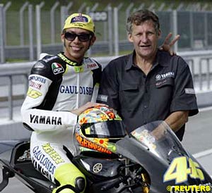 Valentino Rossi and his crew chief Jeremy Burgess with their new steed, the Yamaha M1