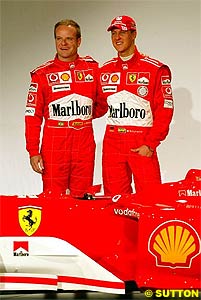 Barrichello and Schumacher on stage with the F2004