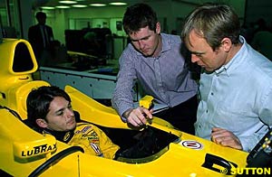 Giancarlo Fisichella with Rob Smedley and David Brown at the Jordan factory