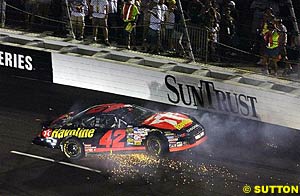 Jamie McMurray crashes out after contact from Joe Nemechek