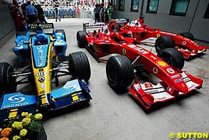 Fernando Alonso's Renault and the Ferraris of Michael Schumacher & Rubens Barrichello