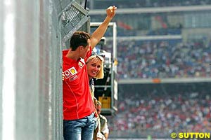 Michael Schumacher salutes the crowd in Germany