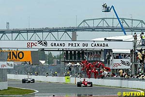 Michael Schumacher leads home brother Ralf in the Canadian Grand Prix