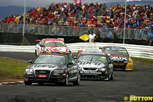 The safety car leads David Besnard, Jason Bright, Anthony Tratt and Mark Skaife during the first safety car period