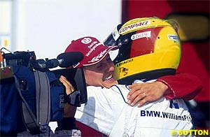 Michael congratulates Ralf on his maiden win. Imola 2001