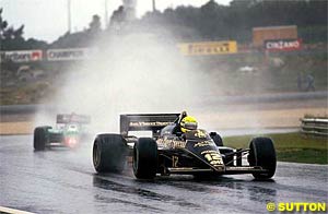Senna the rain wizard on way to his first win. Estoril 1985