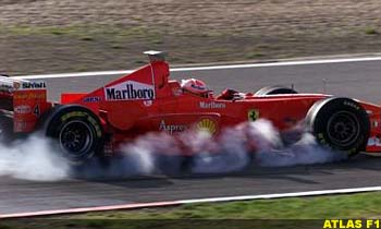 Eddie Irvine locking up during the 1998 European GP