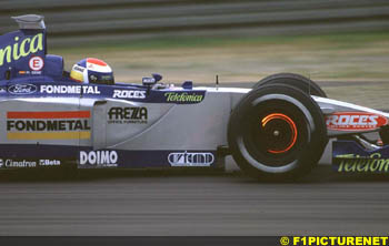 Marc Gene makes a point for Minardi