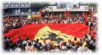 The tifosi celebrate Schumacher's win, 1996