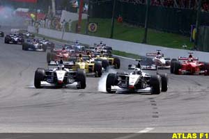 Coulthard overtakes Hakkinen at Spa