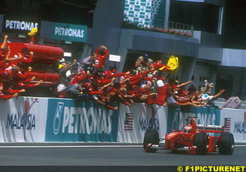 The Ferrari team welcomes Irvine