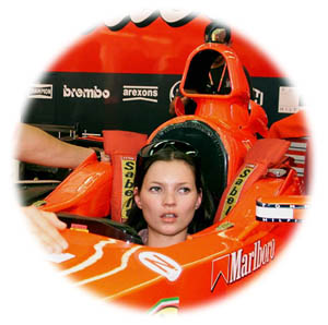 Kate Moss squeezed in a Ferrari Cockpit