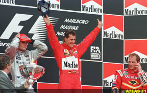 Schumacher, Coulthard and Villeneuve on podium