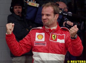 Barrichello celebrates taking pole position, today