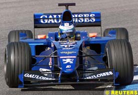 Heidfeld in the Prost, at Barcelona today