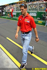 Schumacher walks back to the garage